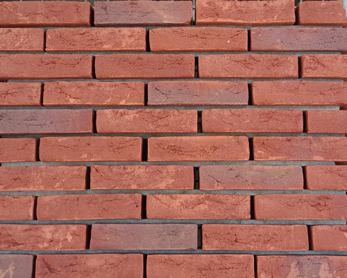 Metselsteen Bommels bont speciaal handvorm geschaafd waalformaat.