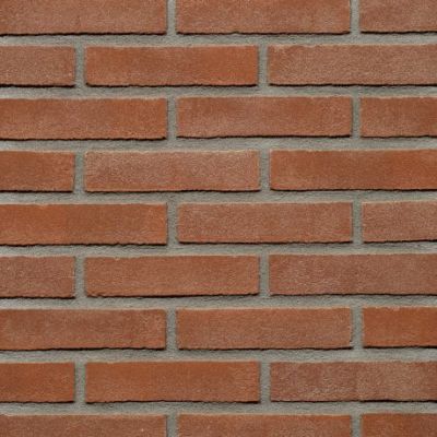 waalformaat metselstenen roodbruin op een gemetselde muur
