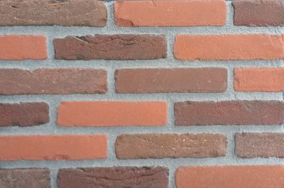 metselstenen waalformaat rood gemêleerd in horizontale muur constructie