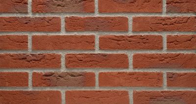 waalformaat metselstenen rood in traditioneel verband op buitenmuur gemetseld