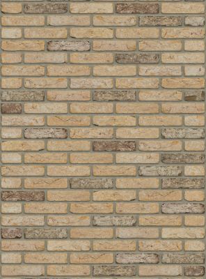 waalformaat metselstenen retro geel op een gemetselde muur