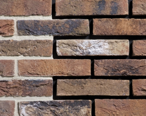 Metselstenen handvorm Geba 299 bruin bont.